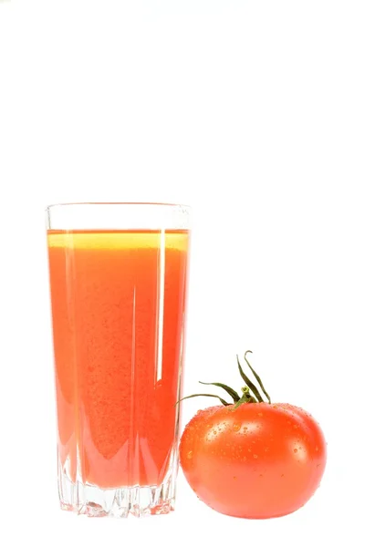 Pomodoro rosso e un bicchiere di succo — Foto Stock