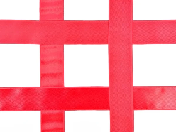 Fita vermelha em um fundo branco — Fotografia de Stock