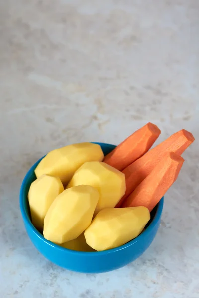 Peeled carrots and potatoes — Stock Photo, Image