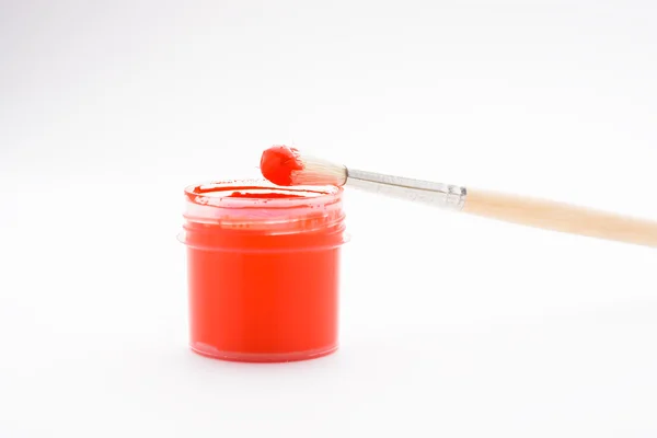 Paint in jars and brush — Stock Photo, Image