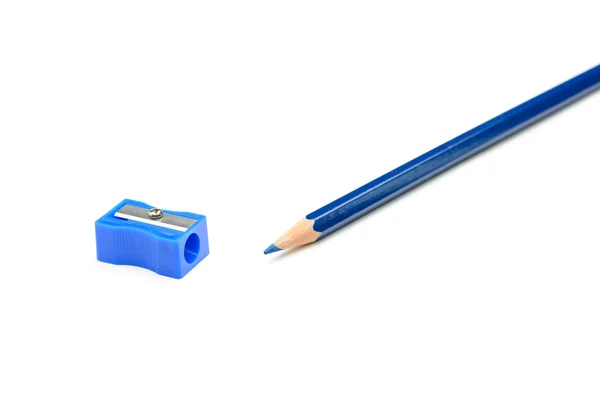 Blue pencil and a pencil sharpener — Stock Photo, Image