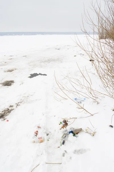 Pile of debris on the white snow