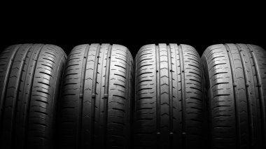 Tyres in dramatic lighting clipart