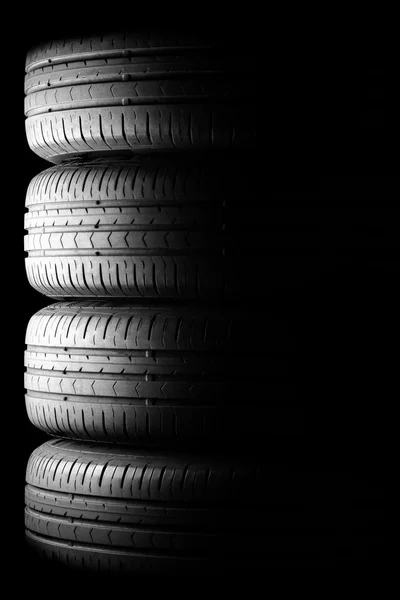 Tyres in dramatic lighting — Stock Photo, Image