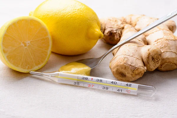 Lemon, ginger, thermometer — Stock Photo, Image