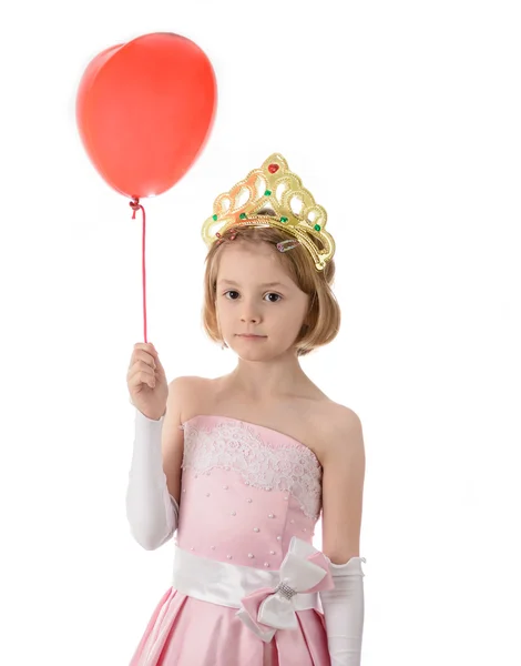 Holčička v růžových šatech drží balon — Stock fotografie
