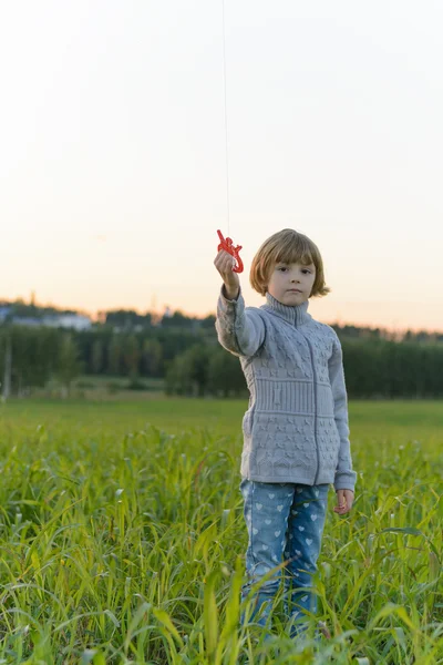 Girl playing with a kite — Stock Photo, Image