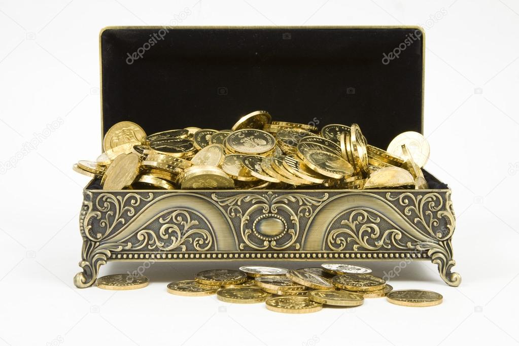 Gold casket and gold coins on a white background