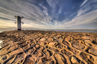 Lighthouse windmill Stawa Mlyny, Swinoujscie, Baltic Sea, Poland. clipart