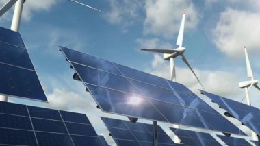 Yeşil enerji çiftliğinde güneş paneli hücreleri ve dönen rüzgar türbinleri