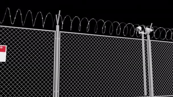 Valla de alambre de púas cerca de la cárcel área restringida en la zona privada prohibida en negro — Vídeo de stock