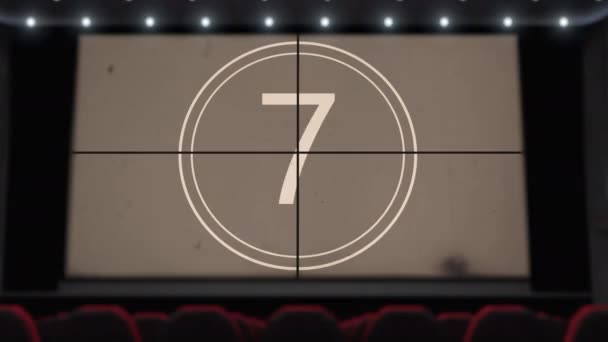 Film countdown on the cinema screen in the movie theater without audience — Stock Video