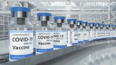 Corona virüs aşı üretimi ampule şişeleri nakliye hattında