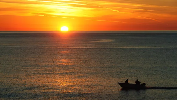 Fish boat at sunset. — Stock Photo, Image