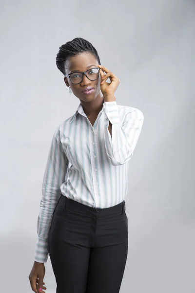 Beautiful businesswoman on gray — Stock Photo, Image