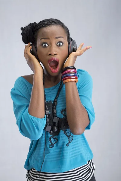 Woman wearing headphones — Stock Photo, Image