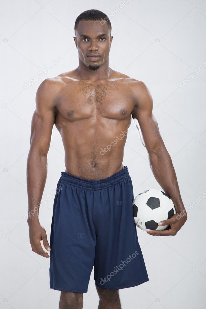 Athlete holding a football