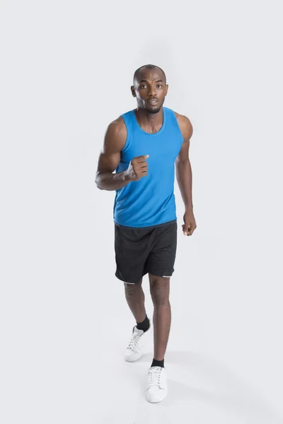 Mužský atlet běží — Stock fotografie