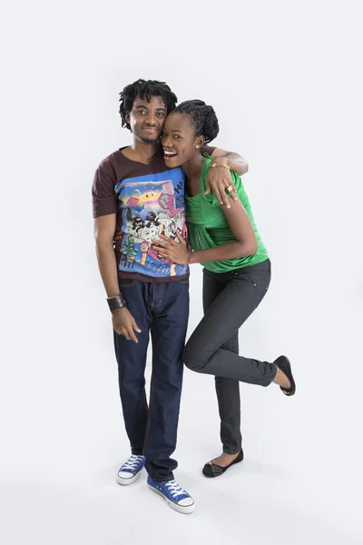 Happy young couple in the studio — Stock Photo, Image