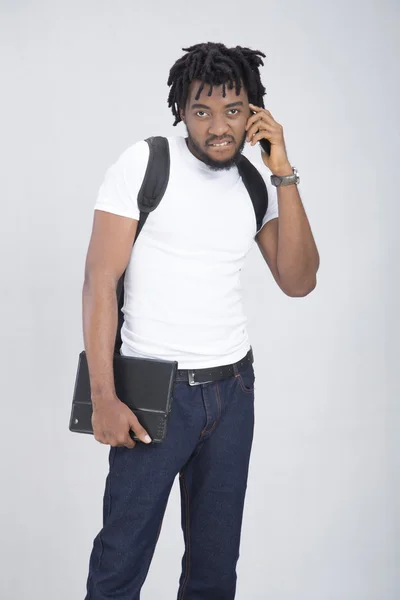 Student holding a copybook — Stock Photo, Image