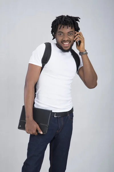 Student holding a copybook — Stock Photo, Image