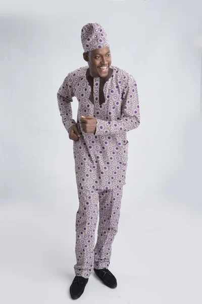 Young man dancing in traditional clothes — Stock Photo, Image