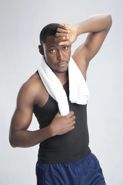 Young sportsman posing with towel on neck — Stock Photo, Image