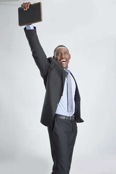 Joven hombre de negocios feliz con tableta — Foto de Stock