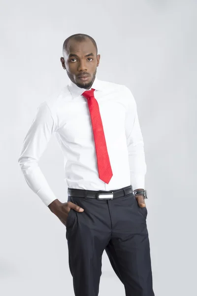 Young serious businessman with red tie — Stock Photo, Image