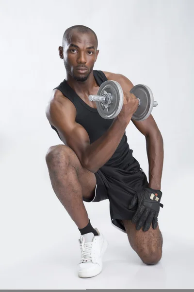 Joven de negro con mancuerna — Foto de Stock