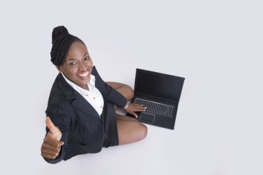 Businesswoman rejoicing success with notebook isolated clipart