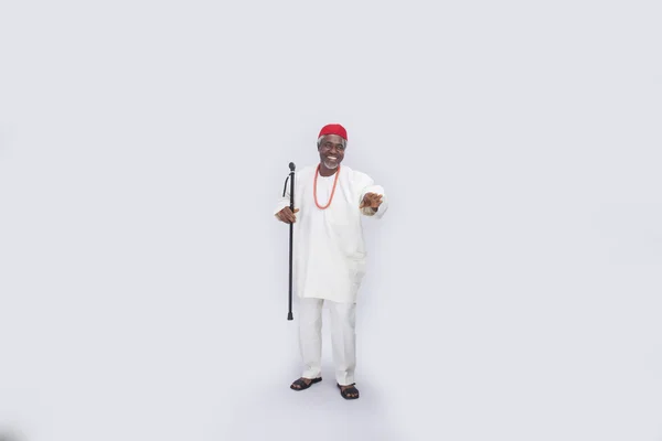 bir baston tutan adam