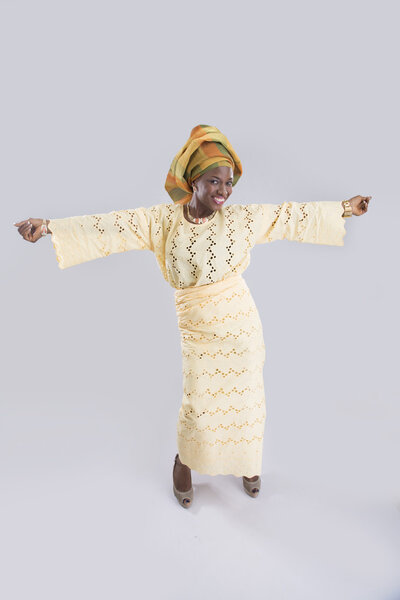 Woman dancing and smiling isolated