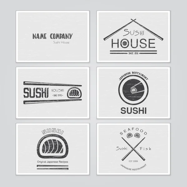 Sushi y rollos de un conjunto. Cocina japonesa. Etiquetas tipográficas, logotipos e insignias . Gráficos Vectoriales