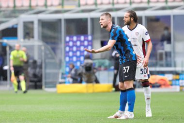 Italy, Milan, april 11 2021: Milan Skriniar (Inter defender) gives advices to teammates in the first half during football match FC INTER vs CAGLIARI, Serie A 2020-2021 day30, San Siro stadium