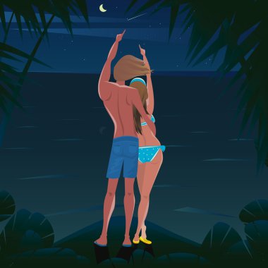 Yıldız ve kuyruklu yıldız bakarak sahilde Çift