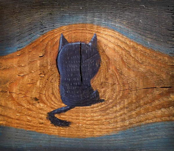 Silhouette Of Black Cat On Cut of Wood — Stock Photo, Image