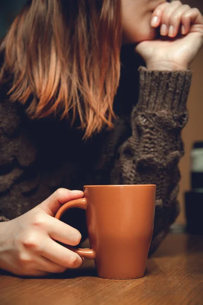 Coffee cup in female hands — Stock Photo, Image