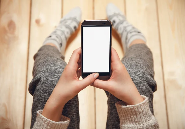 Girl with a phone in her hands