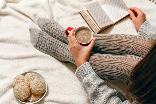 Young Woman Sweater Stockings Biscuits Red Coffee Cup Hands Relaxing — Stock Photo, Image