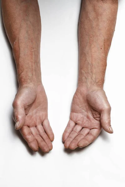 Wrinkled Hands Elderly Man Table Close Isolated White Background Top — Stock Photo, Image