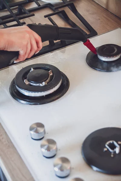 Glass ceramic stove cleaning with a steam cleaner and house disinfection.