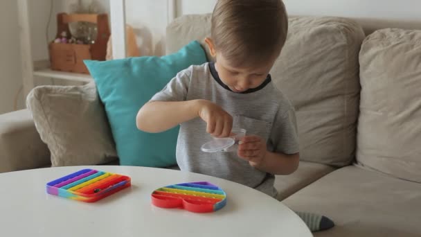 Pop it toy fidget, Child play with antistress toy — Stock video