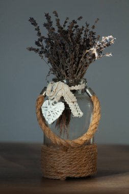 lavender dried bouquet in a vase with jute decor, indoor