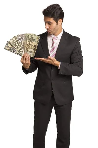 Podnikatel drží peníze / dolar — Stock fotografie