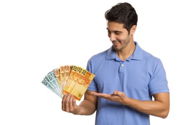 Bir işadamı gösteren Brezilya para
