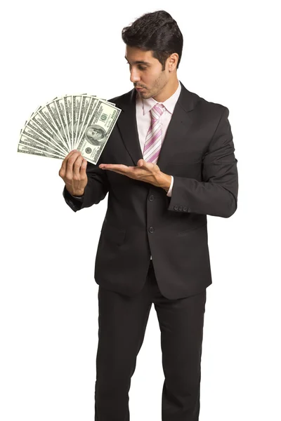 Podnikatel drží peníze / dolar — Stock fotografie