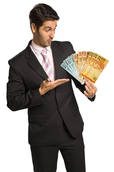 Üzleti ember, aki a brazil pénz / valódi — Stock Fotó