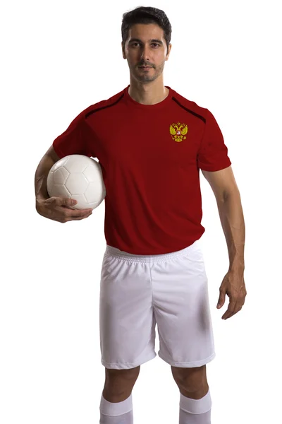 Российский футболист держит мяч на белом фоне — стоковое фото