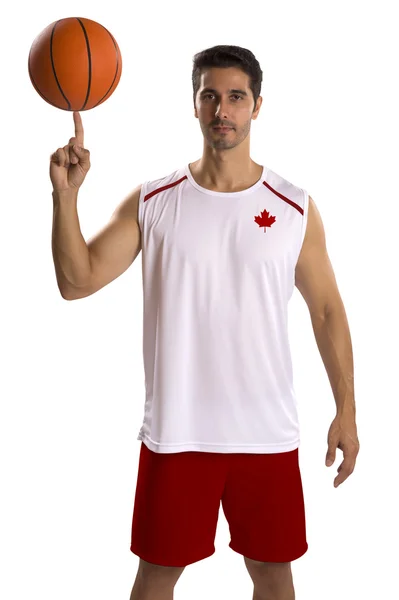 Kanadyjski koszykarz, grający z piłką. — Zdjęcie stockowe